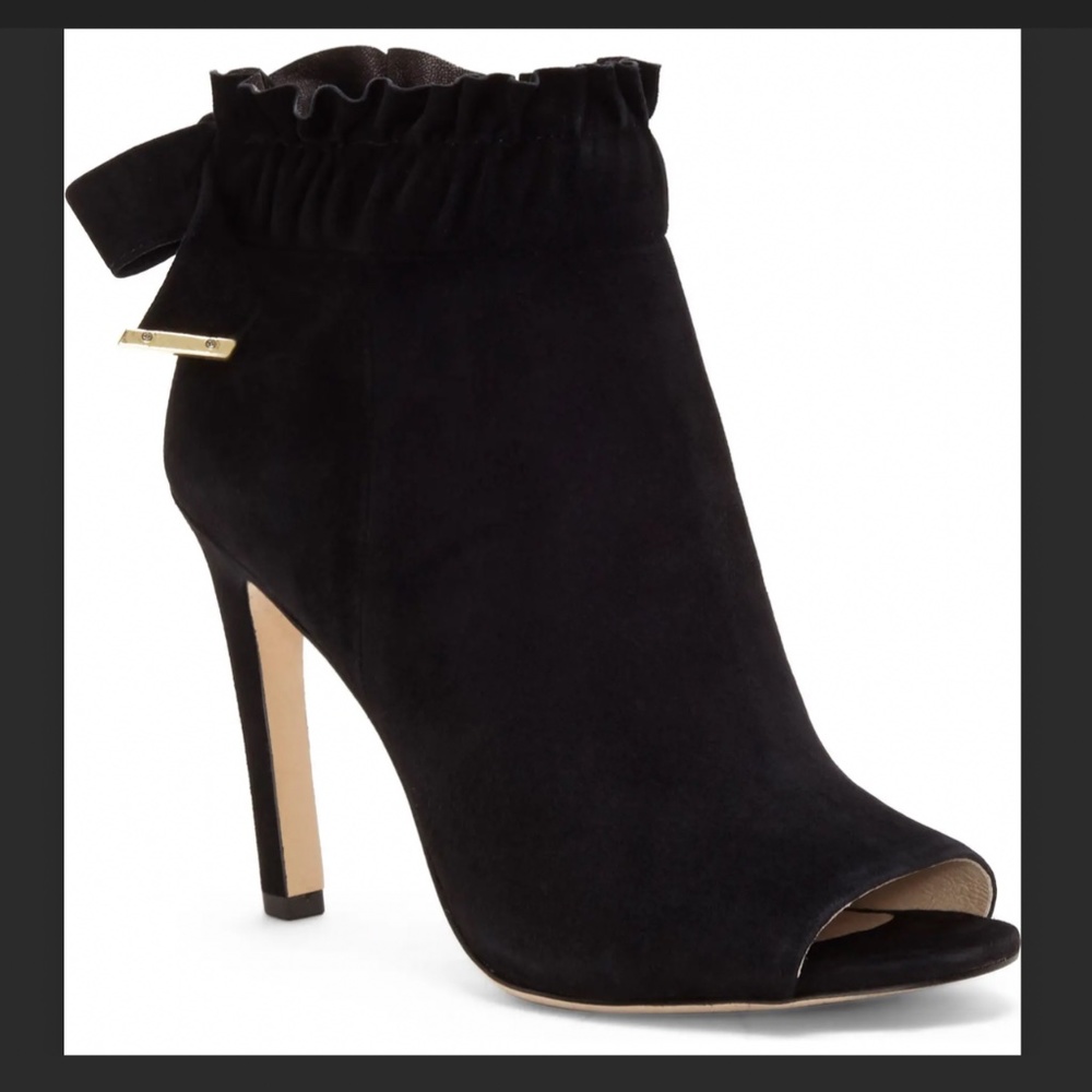 “Innay” Open-toe, black suede booties with gold tipped ribbon and ankle ruffles!